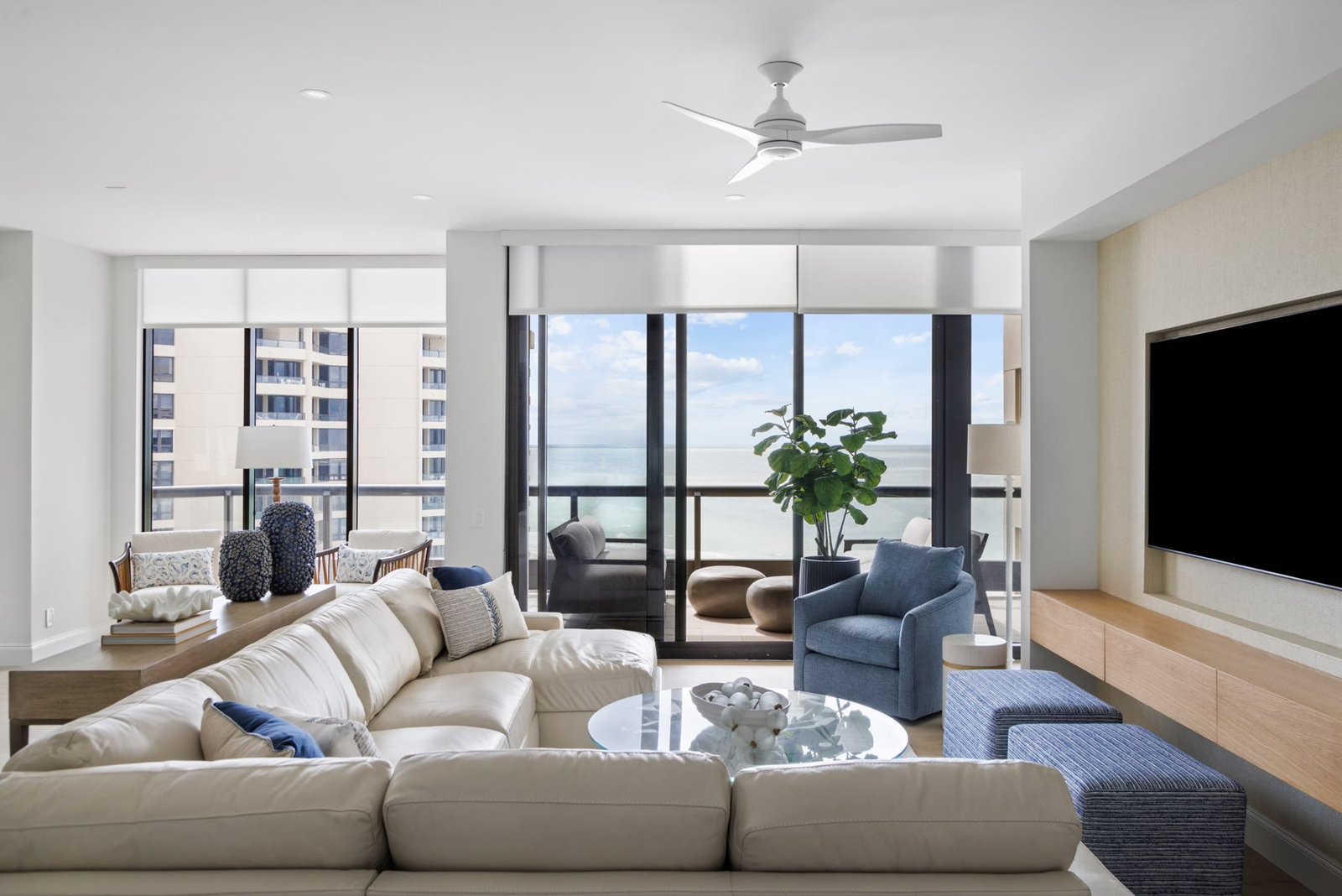 Gulf-front condominium living room with sliders to a balcony