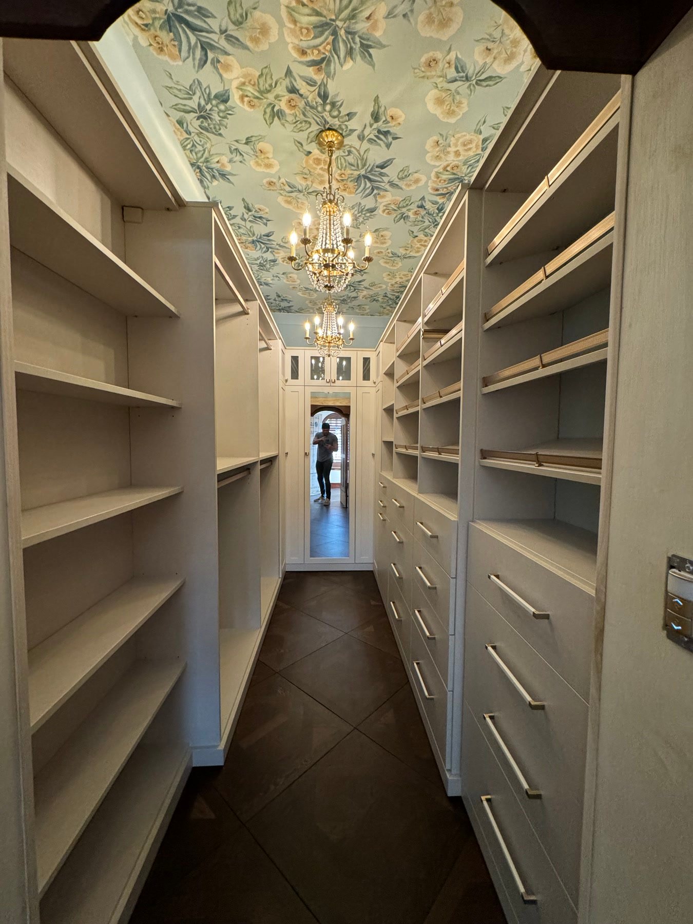 During: closet millwork under a painted ceiling — new work fluent in the old house