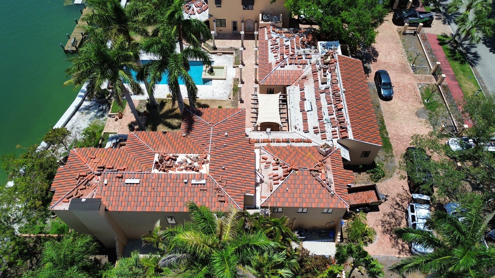 During: tile field going down, dumpsters in the drive, canal and pool held