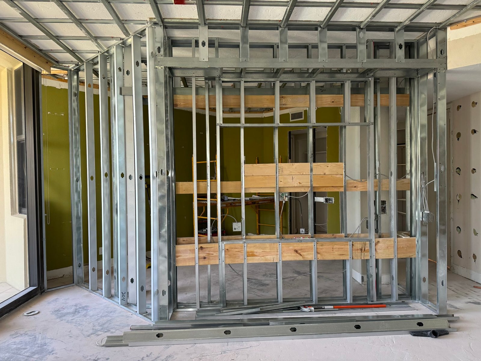 During: metal stud and wood blocking for the guest suite carved from leftover living space