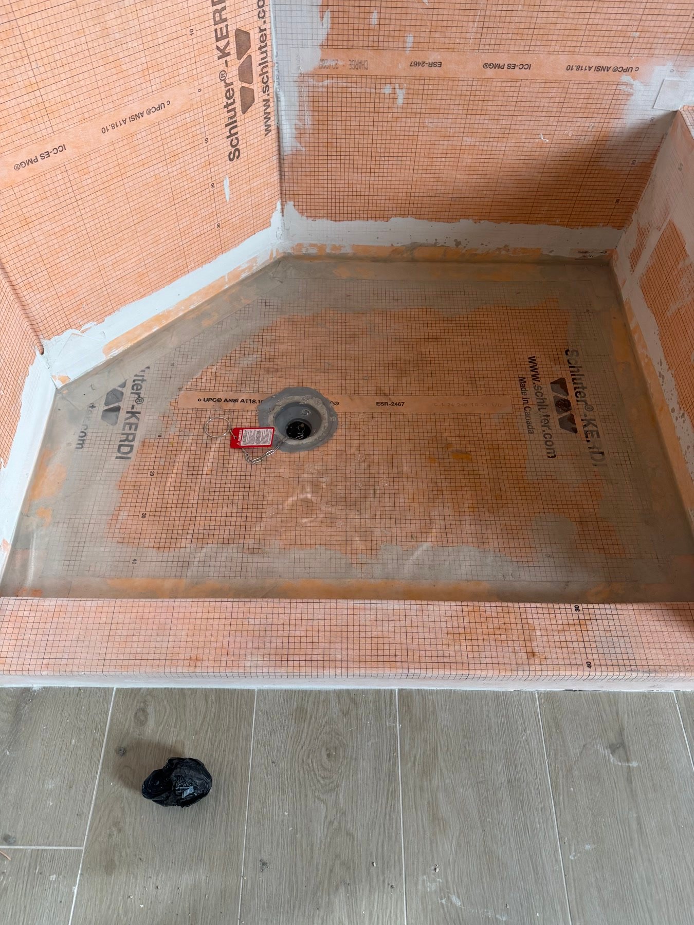 During: Schluter Kerdi waterproofing in a shower pan before tile